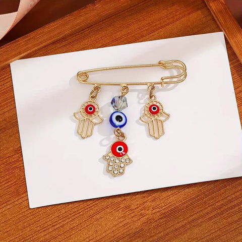 Broche Elegante de Ojo Turco y Mano de Hamsa 5cm - Indigo72.com