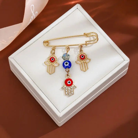 Broche Elegante de Ojo Turco y Mano de Hamsa 5cm - Indigo72.com