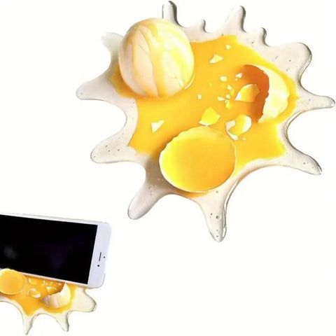Broma de huevo roto divertido Soporte de teléfono - Indigo72.com